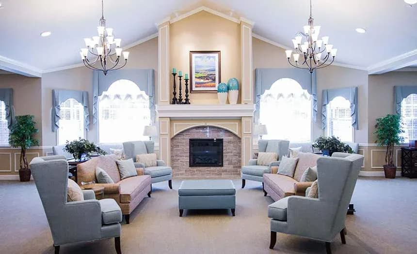 Lounge centered around a fireplace