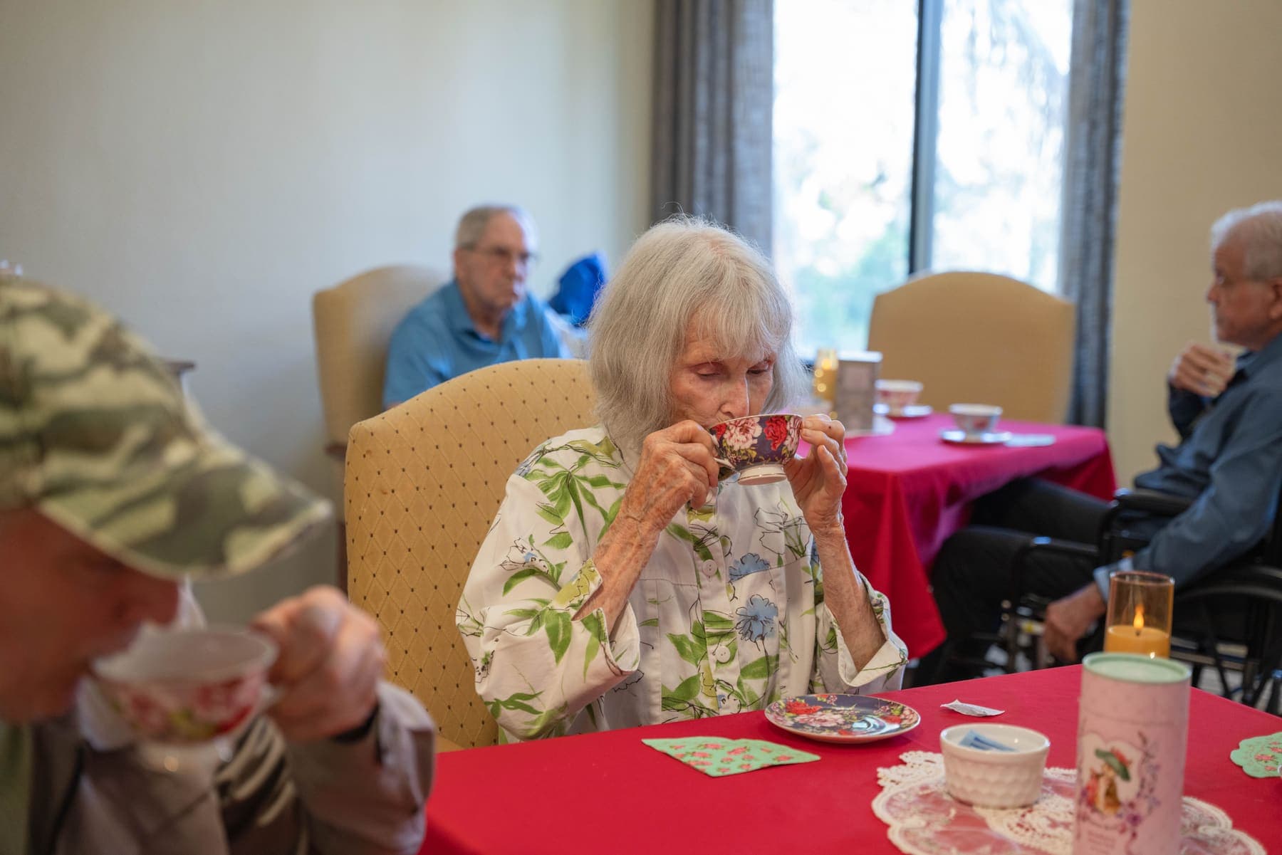 A resident explores the scents during a tea-tasting activity