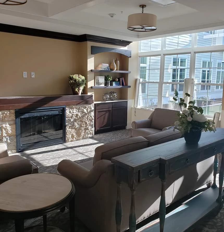 Lounge with a stone fireplace