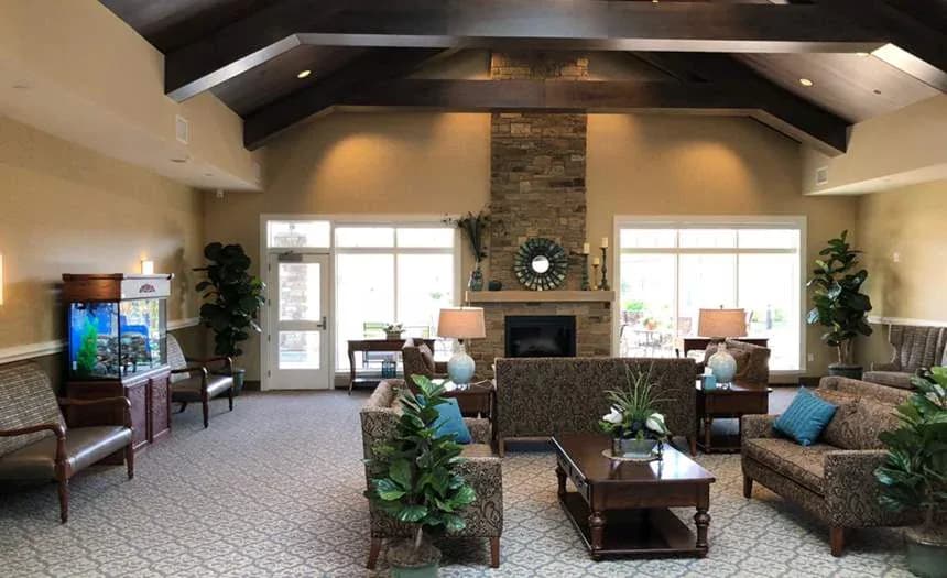 Living room with a stone fireplace
